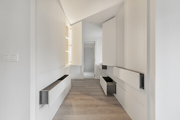 A dressing hallway that leads to an en-suite bathroom