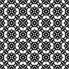 White background with black pattern. Seamless texture for fashion, textile design,  on wall paper, wrapping paper, fabrics and home decor. Simple repeat pattern.