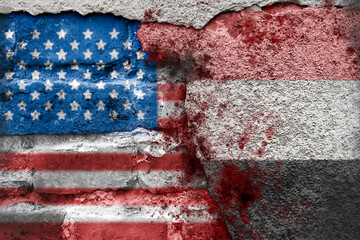 USA and Yemen. Conflict, crisis of international relations, fight against terrorism. American flag and Yemeni flag on a brick wall with blood splatters. Global war.