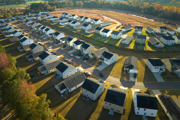 Aerial view of tightly packed homes in South Carolina residential area. New family houses as example of real estate development in american suburbs