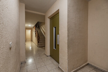 A service elevator inside an urban residential building