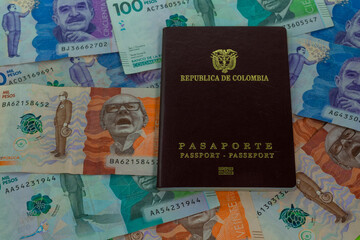 Colombian passport on money background (