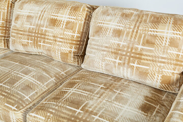 Vintage 1970s beige and taupe patterned fabric sofa.  Close-up detail.