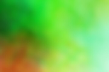 Abstract blurred background image of green, orange colors gradient used as an illustration. Designing posters or advertisements.
