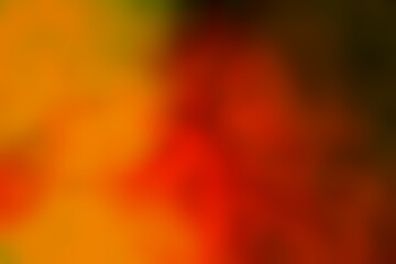 Abstract blurred background image of red, orange colors gradient used as an illustration. Designing posters or advertisements.