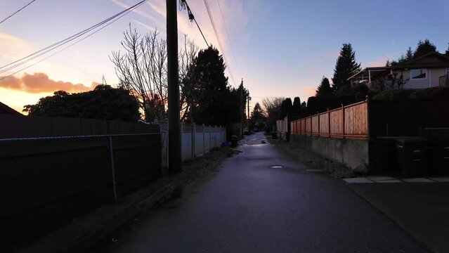 Scenic Alley in Suburban Neighborhood. Homes, Trees. Winter Season, Sunset Sky. Trees. Burnaby, Vancouver BC Canada.