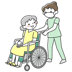 女性患者の乗った車いすを押す女性看護師