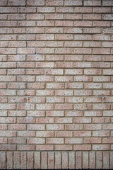 Modern beige brick wall  background texture. Home and office interior design backdrop.