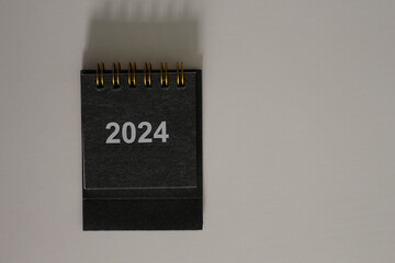 Calendar template for the new year, 2024. Place it elegantly on your clean, white work desk for a touch .