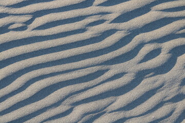 Fototapeta premium Wave patterns formed by the wind on the beach