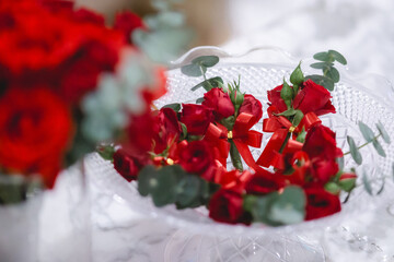 red and white flowers decoration in wedding ceremony