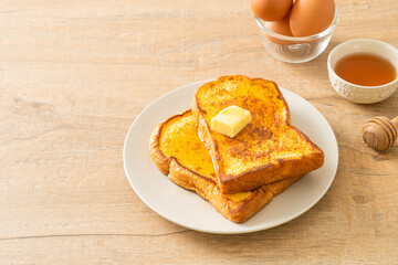 French toasted with butter and honey