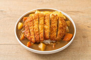 curry rice with fried pork cutlet and creamy omelet