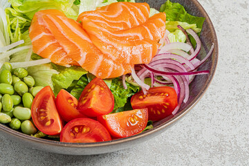 sashimi salad on the stone background