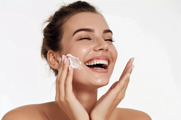 Close-up beauty portrait of a Lady with happiness applying a bit of face cream.Happy emotional daily routine, anti-aging, wrinkle reduction cosmetic theme. - obrazy, fototapety, plakaty