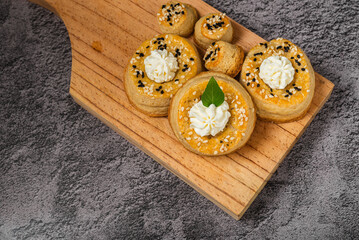 Puff pastry rolls with cream cheese. Desserts with cream cheese.