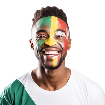 front view of a handsome man with his face painted with a South African flag colors smiling isolated on a white transparent background 