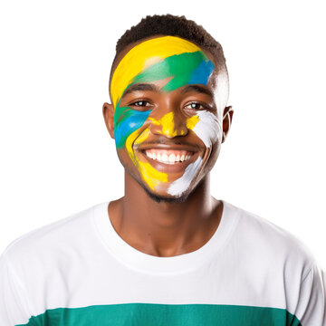 front view of a handsome man with his face painted with a Tanzania flag colors smiling isolated on a white transparent background 