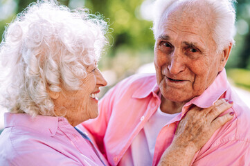 old modern couple dressing fashionable colored clothes
