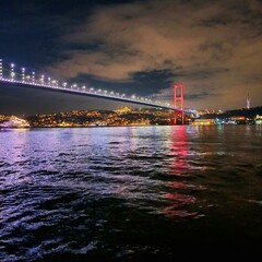 The night view of Bosphorus Bridge seem from camlıca illuminated by purple LED light in Istanbul