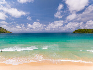 Aerial view of Waves crashing on sandy shore,Sea surface ocean waves background,Top view beach background