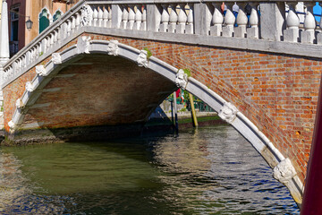 Scenic close-up view of Guglie Bridge with ornaments at Italian City of Venice on a sunny summer morning. Photo taken August 7th, 2023, Venice, Italy.