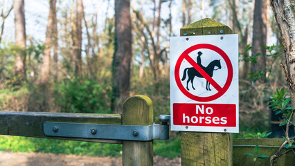 No Horses sign in a woodland country park