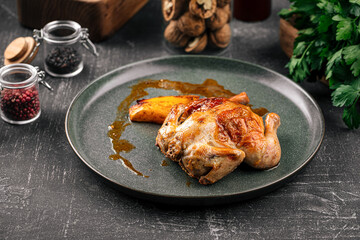 Portion of gherkin chicken with baked potatoes
