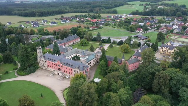 Impressive view of Sychrov castle buildings and park, Czech Republic