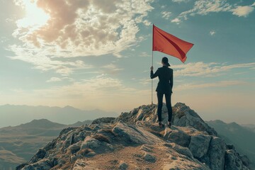 Obraz premium Businesswoman with red flag standing on mountain top, Leadership and victory concept