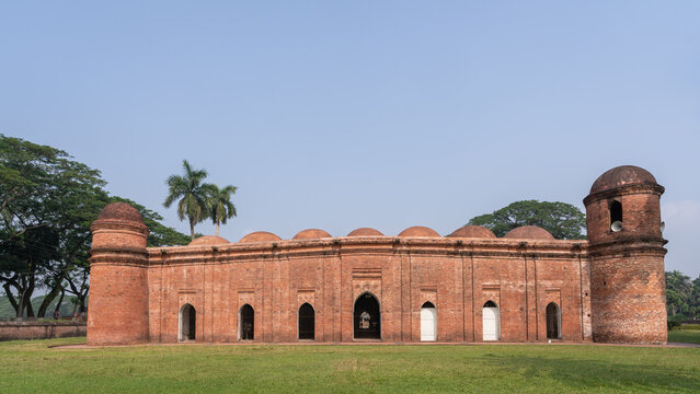 Side view of ancient sixty dome mosque in old Khalifatabad, a UNESCO World Heritage site, Bagerhat, Bangladesh