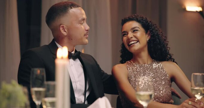 Dinner, date and couple with restaurant, love and happy from commitment at table. Smile, romance and luxury at celebration with wine at night with conversation and fine dining for anniversary