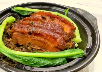 close up of filling of pork buns biapong bak pao traditional chinese indonesian fusion cuisine of babi hong china hong kong braised pork belly cooked with sweet black ketchup sauce in surabaya