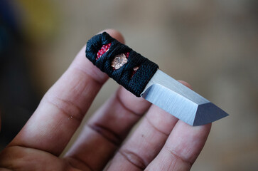 Red and black colure with tanto knife handle wraping