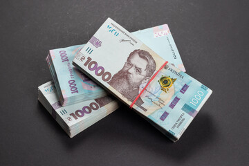 Stack of ukrainian money hryvnia. grivna, hryvna with 1000 banknotes