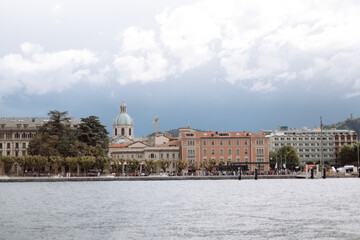 view of the Como lake with town skyline