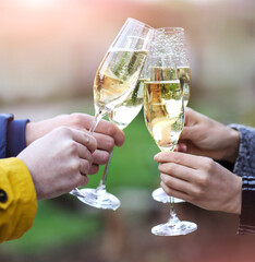  Party with sparkling champagne glasses outdoors