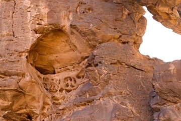 Detail of rock formations in the Tadrart Rouge rocky mountain range in Tassili n Ajjer National Park. Sahara desert, Algeria, Africa.