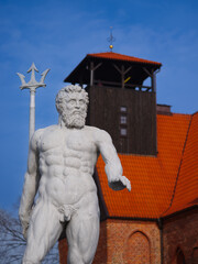  16/02/2023 Hel city with Neptun sculpture in front of museum and church. Hel, Poland. © fotomaster