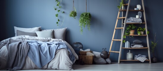 Bedroom with ladder and plant, featuring grey and blue bedding.