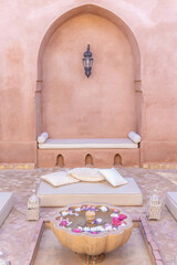 Fototapeta na wymiar marrakech morocco garden courtyard fountain niche