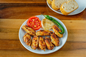 Grilled chicken wings dish