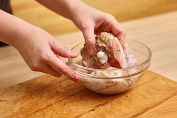 Chicken breast is marinated with spices and salt. Cooking a chicken dish
