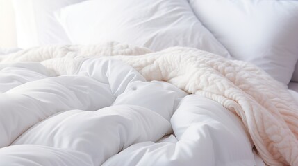 Fototapeta na wymiar Elegant white folded duvet on bed for winter preparation, household or hotel textile perfection