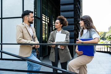 Group of young business people product strategy experts waiting for staff meeting with employer...