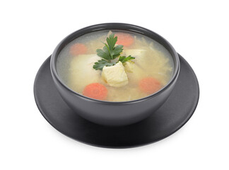 Tasty chicken soup with carrot and parsley in bowl isolated on white
