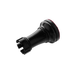 Black wooden chess rook isolated on white