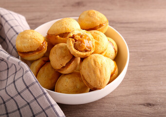 Nut shaped cookies with caramel