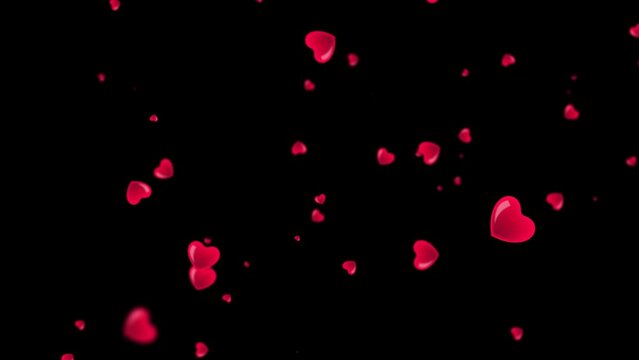Red flat heart flying in cinematic slow motion in alpha mask on a black transparent background for Valentine's Day 