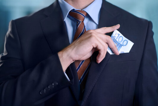 Business, person and cash in pocket, bribe or fraud with corporate investment, finance or extortion. Money laundering, professional corruption and financial crime with theft or stealing at company